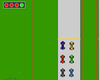 several tiny racing cars are waiting, while the starting lights switch to green